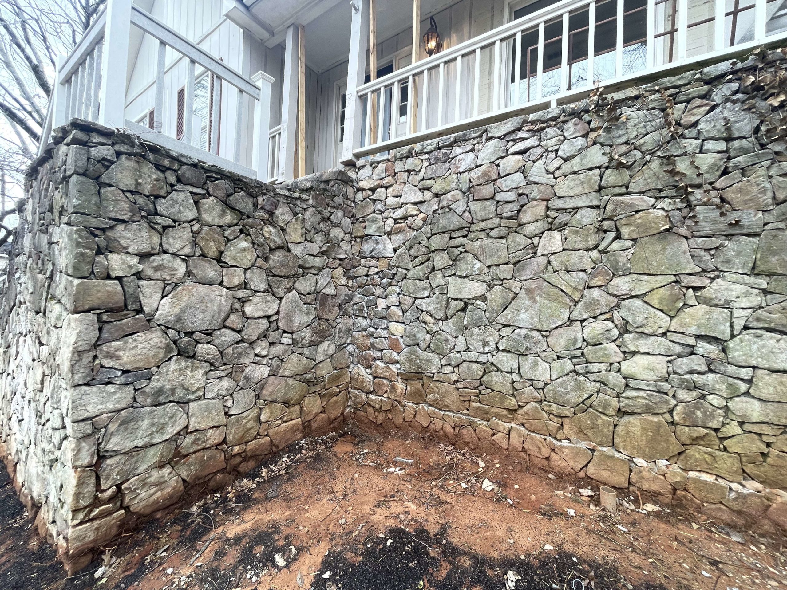 Foundation Stabilization And Porch Realignment Using Helical Piers In Huntsville, Al | Foundation wall