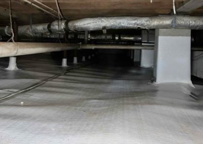 Photo of crawl space in Florence, AL after a complete encapsulation solution is implemented. Water is prevented from entering and humidity controlled to prevent fungus growth and mold.