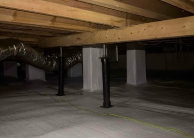 Crawl space in U. Grove's Tuscumbia, AL home fully restored after termite damage repair and waterproofing installation